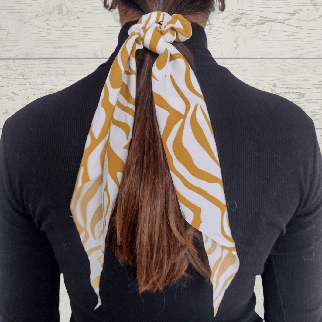 Colet estampado zebra, color mostaza con blanco