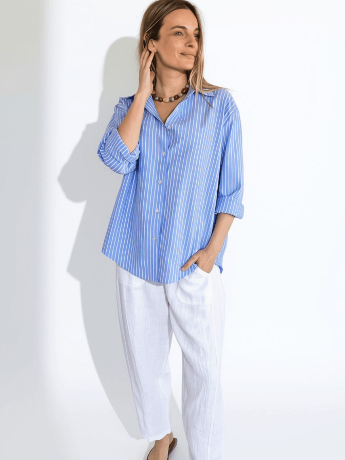 Blusa Rayada, color Celeste con Blanco