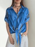 Blusa Estampada con Nudo, fondo Azul