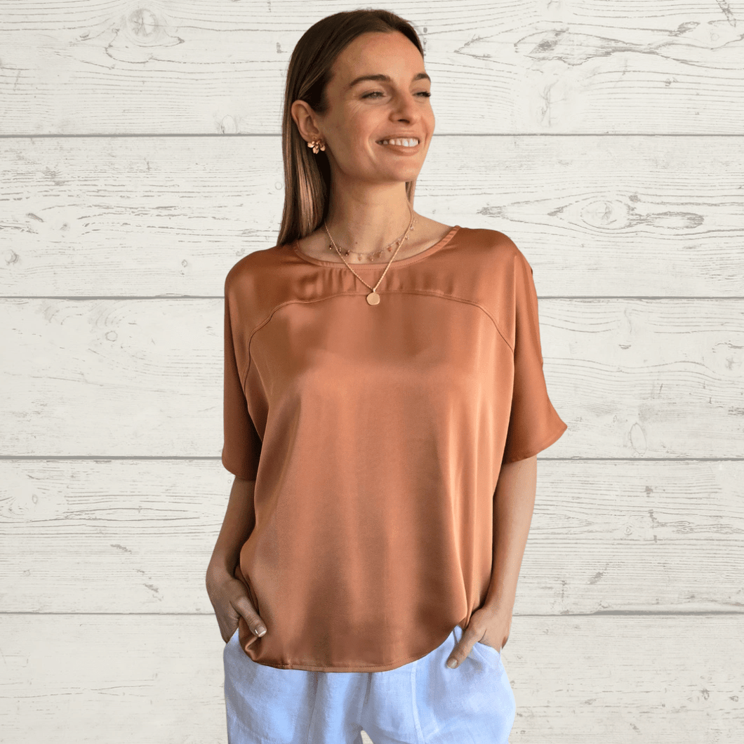 Blusa con botones en la espalda, color Terracota