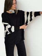 Sweater Mangas Rayadas, color Negro con Blanco
