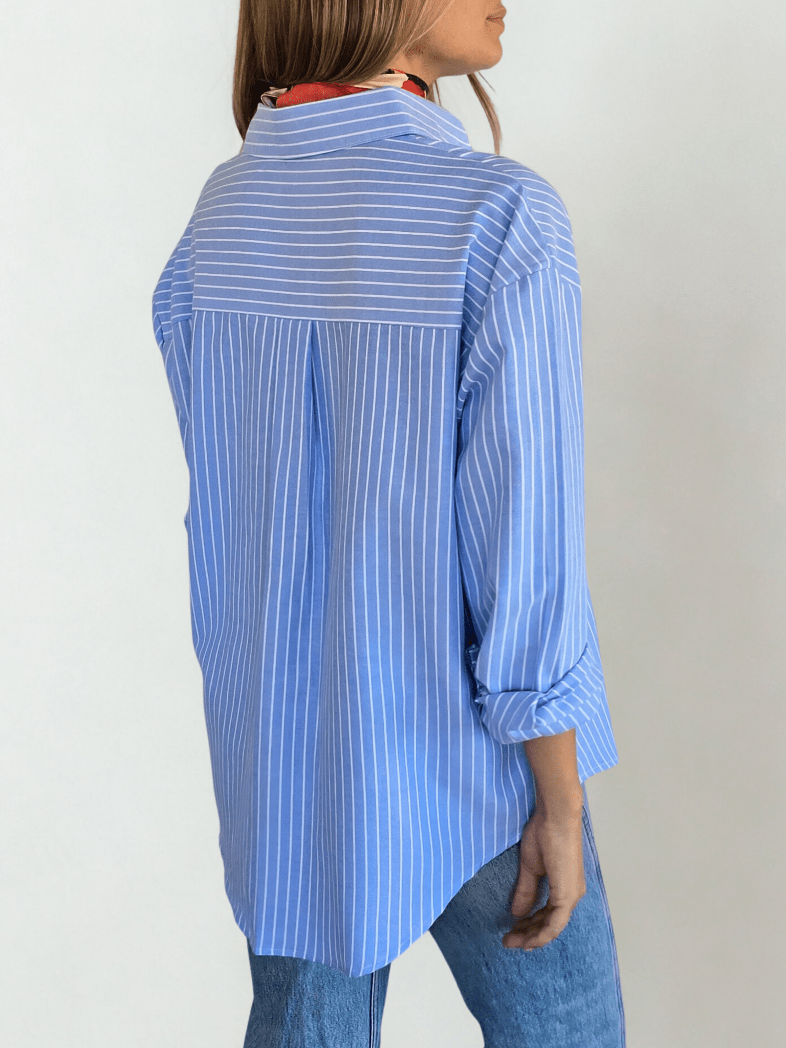 Blusa Rayada, color Celeste con Blanco