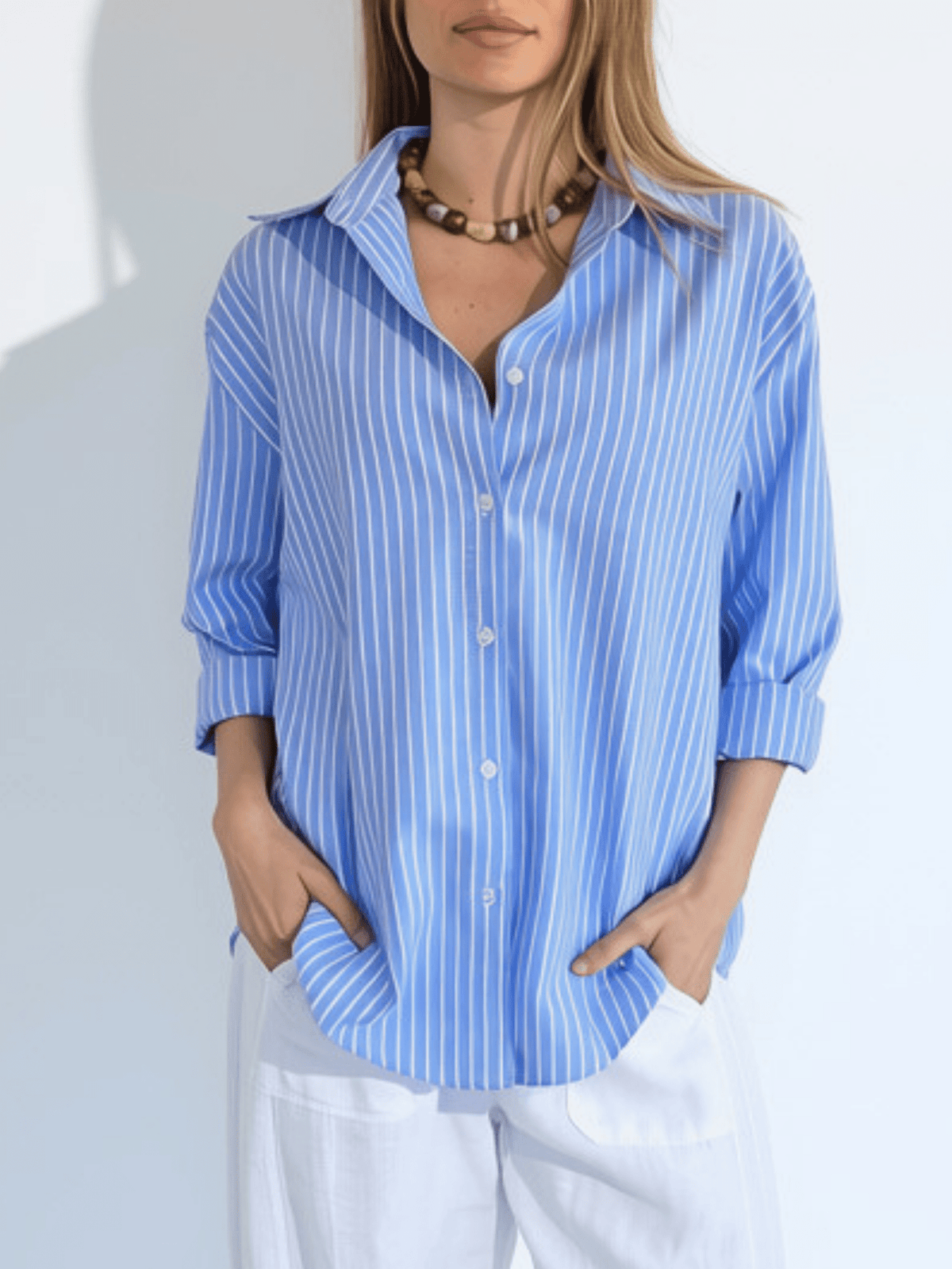Blusa Rayada, color Celeste con Blanco