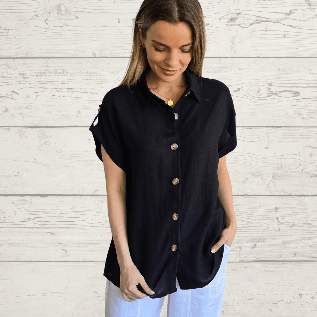 Blusa botón hombro, color Negro