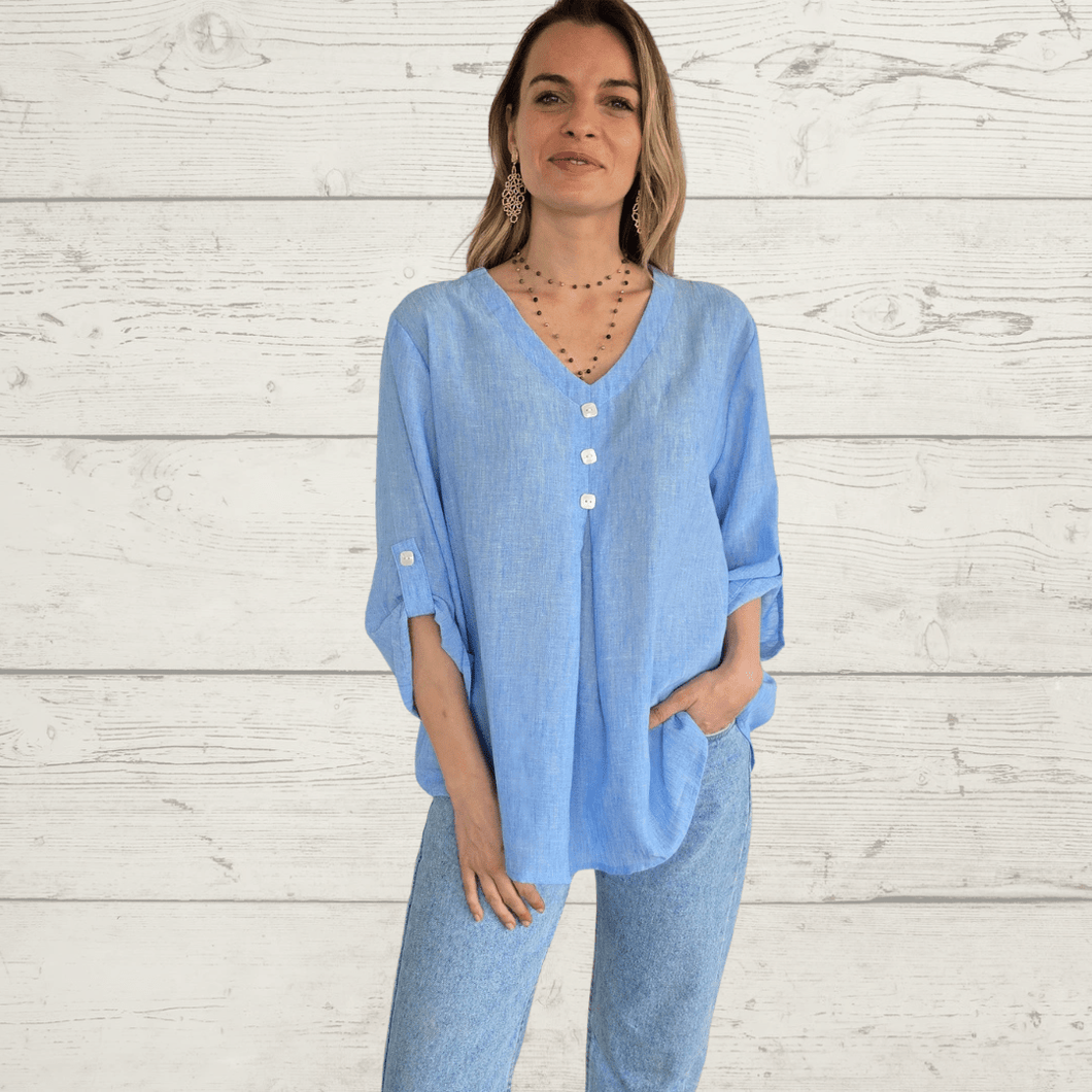 Blusa con botones en el escote, color Celeste