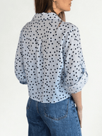 Blusa Lunares escote en V, fondo Celeste con Azul