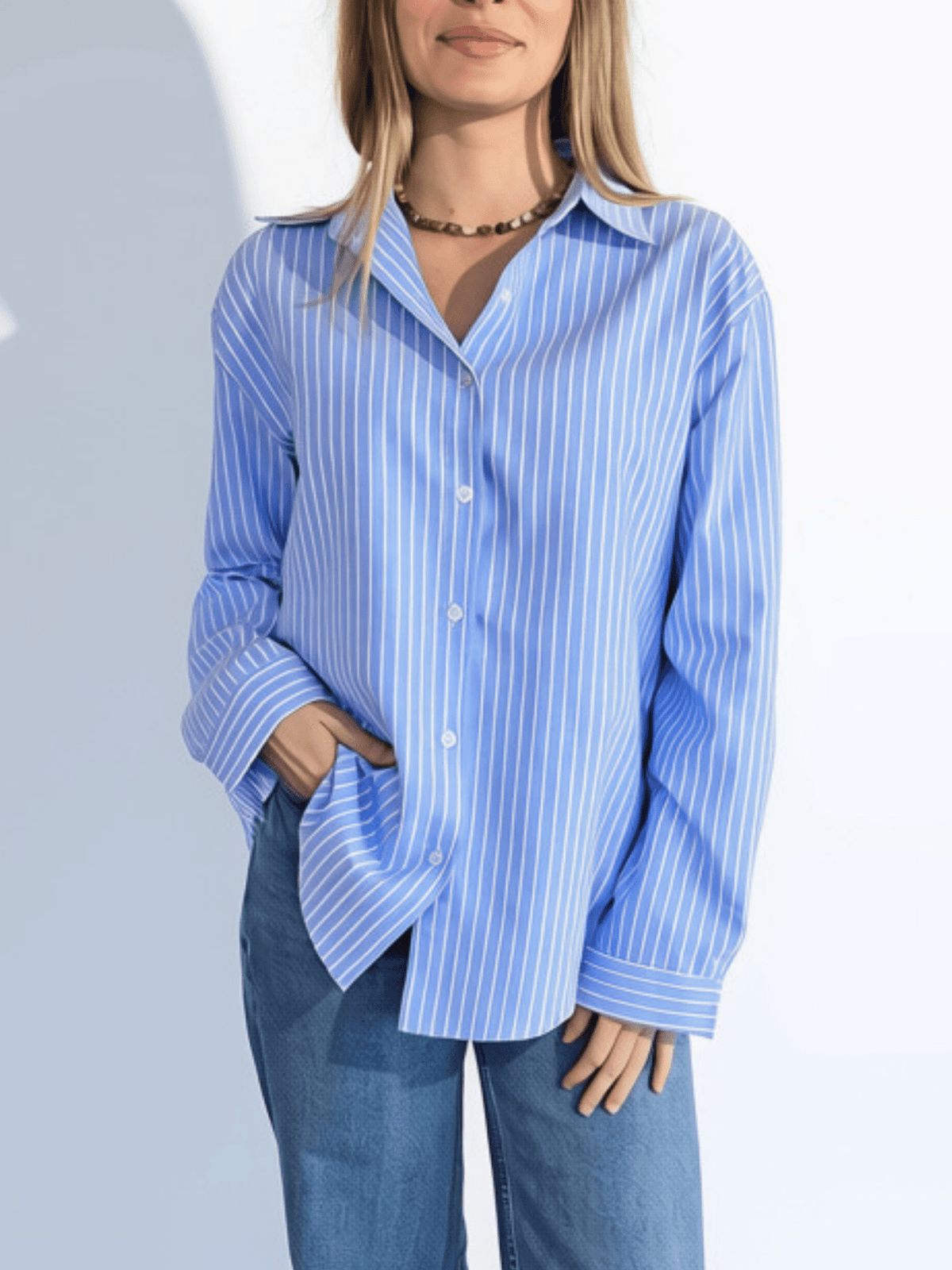 Blusa Rayada, color Celeste con Blanco