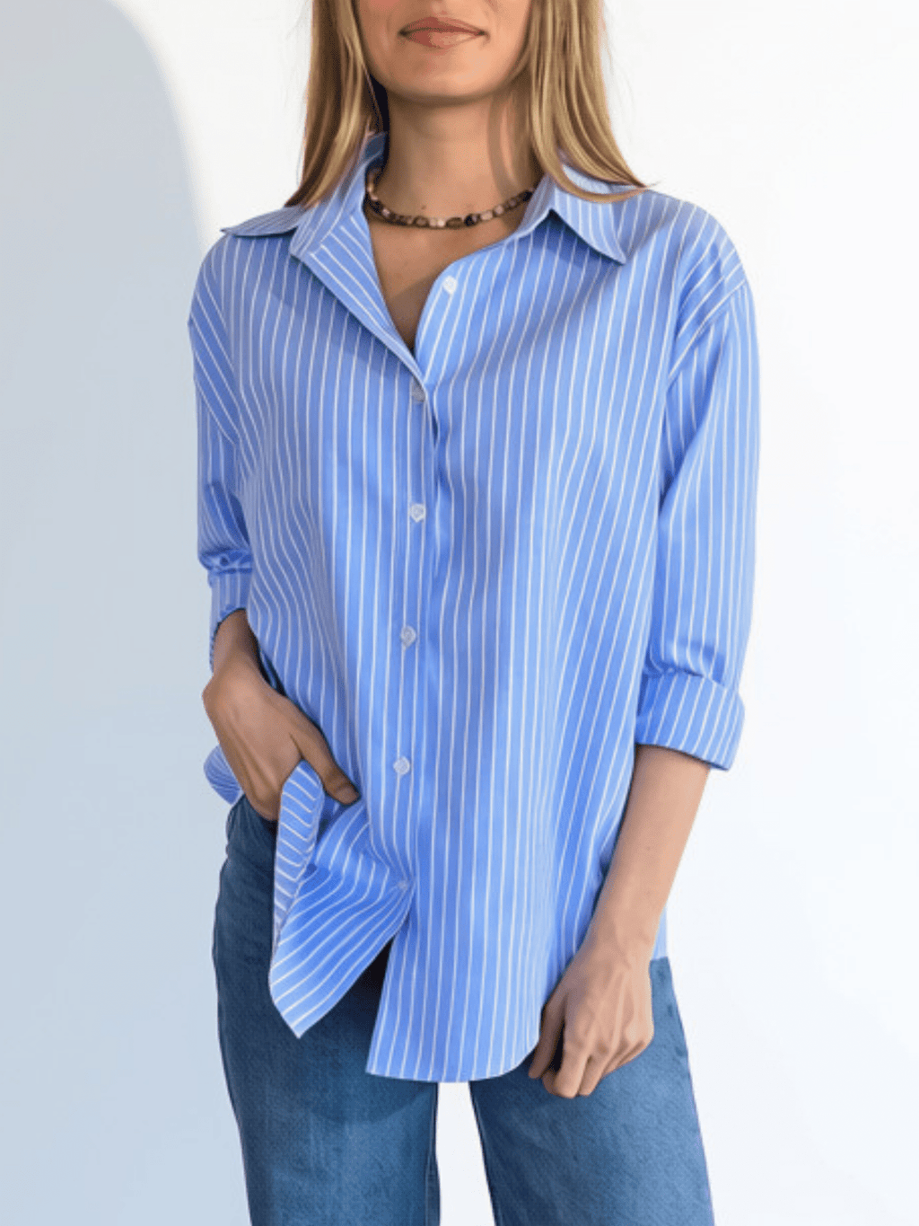 Blusa Rayada, color Celeste con Blanco