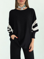 Sweater Mangas Rayadas, color Negro con Blanco
