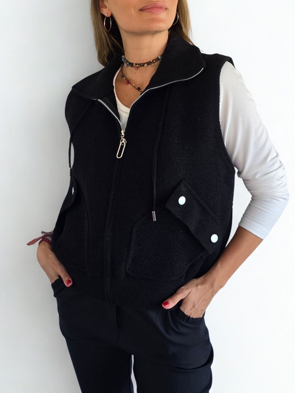 Chaqueta tejida sin mangas, color Negro