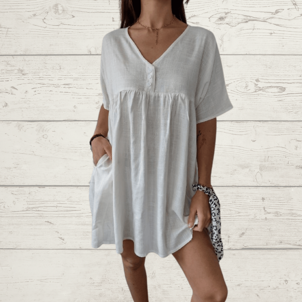 Vestido escote en V tres botoncitos, color blanco